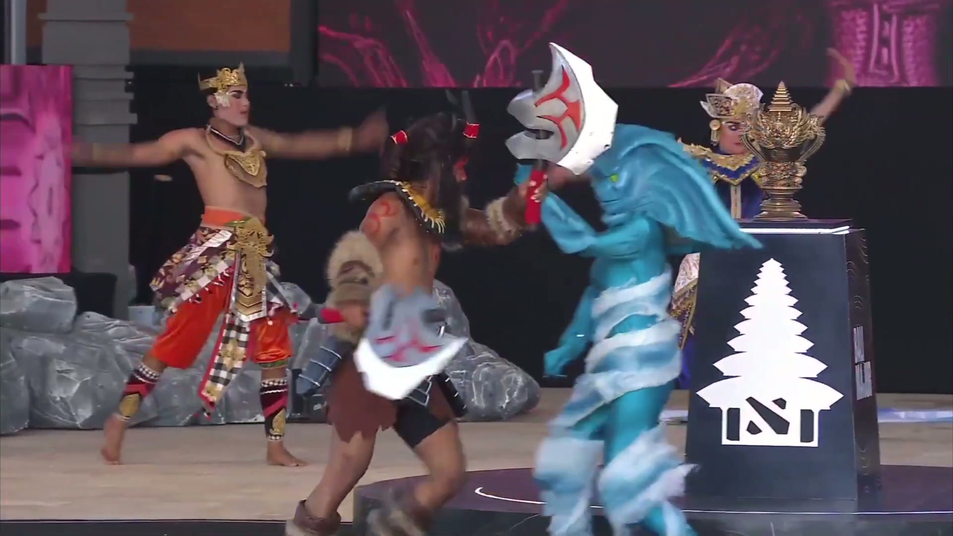 Bali Major trophy on its plinth beside the live event performance