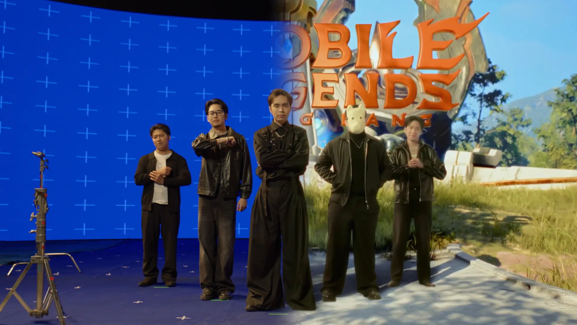 Five performers on a blue screen stage, composited into a Mobile Legends game landscape